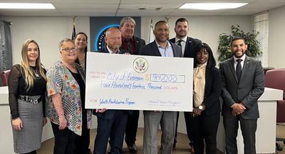 US Congressman Marc Veasey presents Grant Check